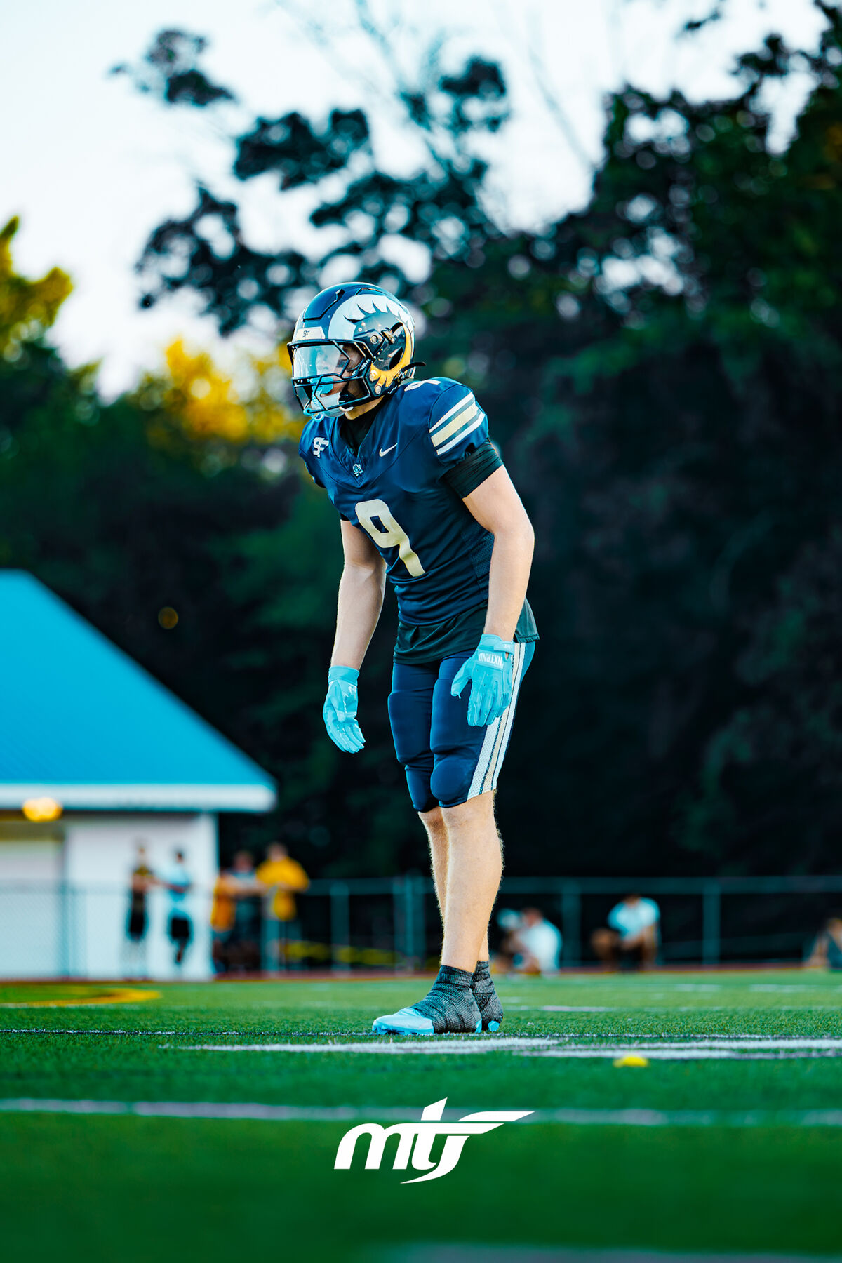 Defensive back set in his stance before the snap